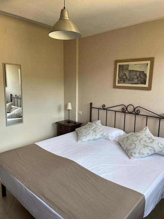 Posteľ alebo postele v izbe v ubytovaní Casa Vacanze La Villetta