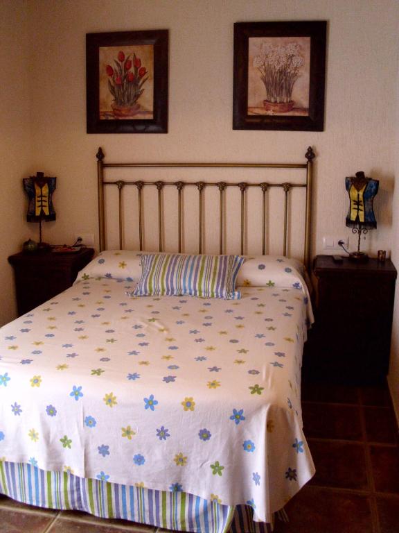 Postel nebo postele na pokoji v ubytování La Posada de Menchu