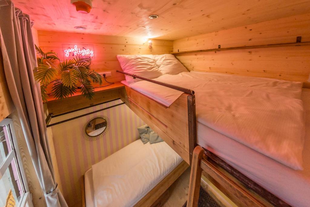 Postel nebo postele na pokoji v ubytování Das Viertel
