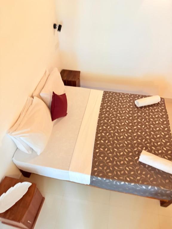 Postel nebo postele na pokoji v ubytování Thisara Luxury Villas