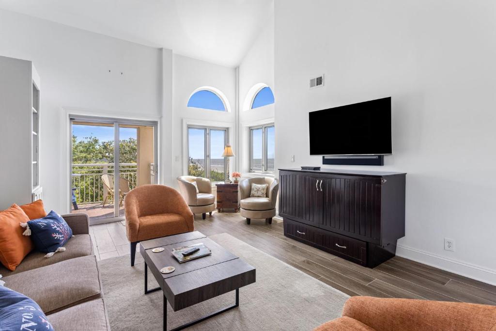 Et tv og/eller underholdning på 5132 Windswept Villa by Akers Ellis Rentals