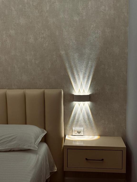 Postel nebo postele na pokoji v ubytování Bliss Boutique Hotel