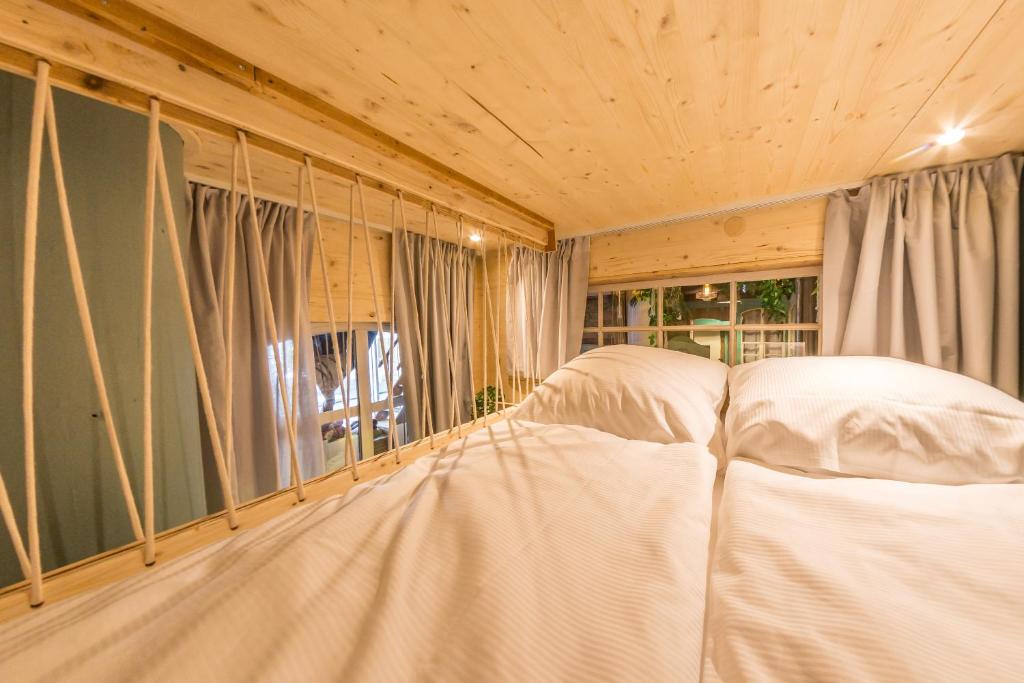 Postel nebo postele na pokoji v ubytování Das Viertel