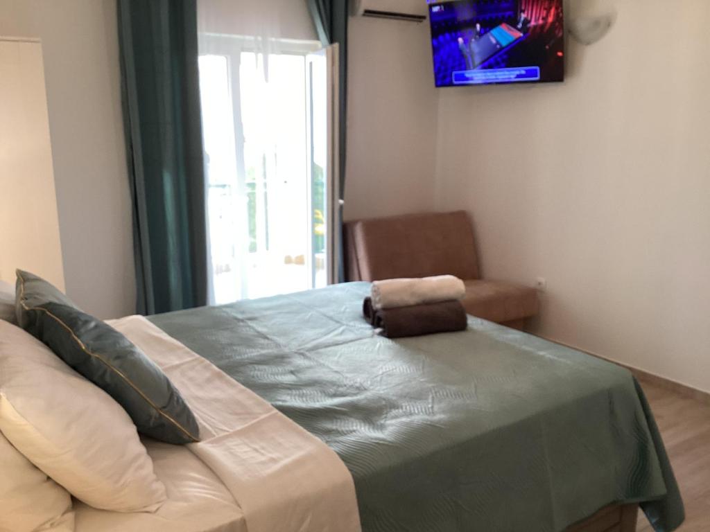Posteľ alebo postele v izbe v ubytovaní Studio apartman Ana