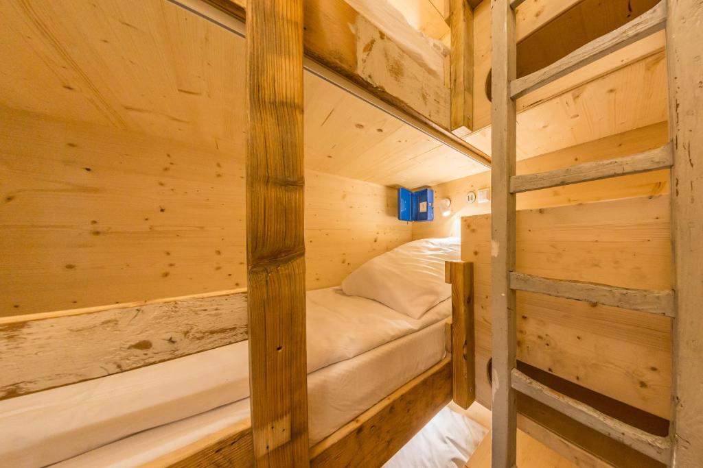 Postel nebo postele na pokoji v ubytování Das Viertel