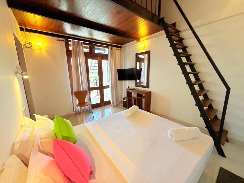 Postel nebo postele na pokoji v ubytování Thisara Luxury Villas