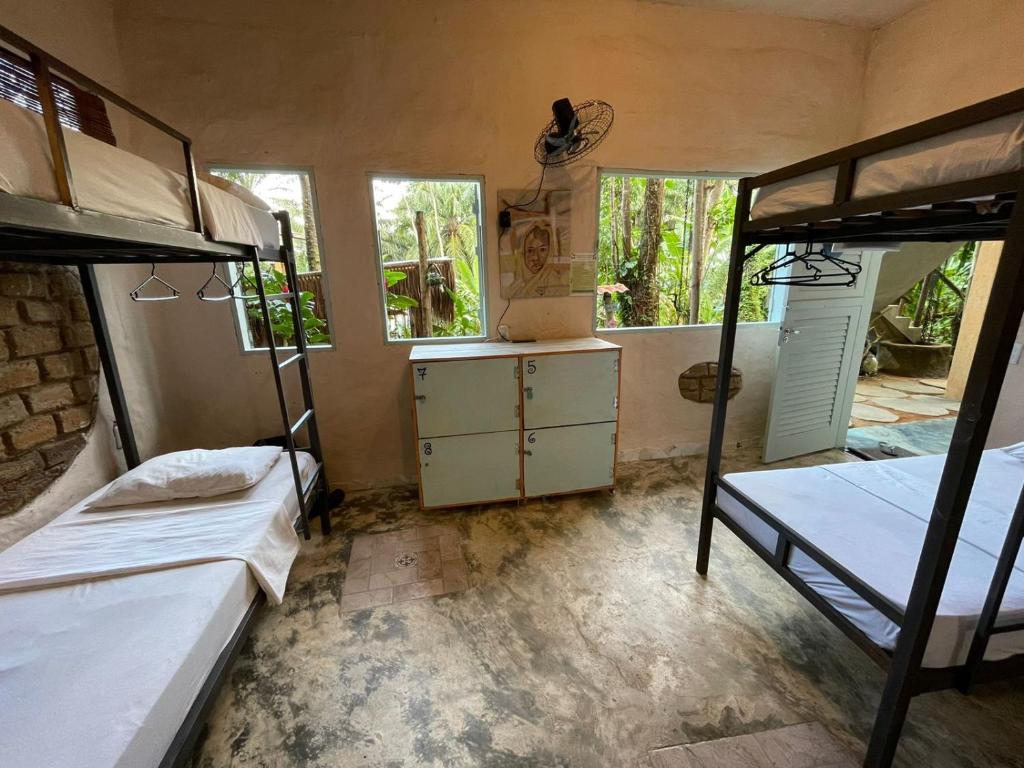 Postel nebo postele na pokoji v ubytování Eco Hostel Bosque di Barro