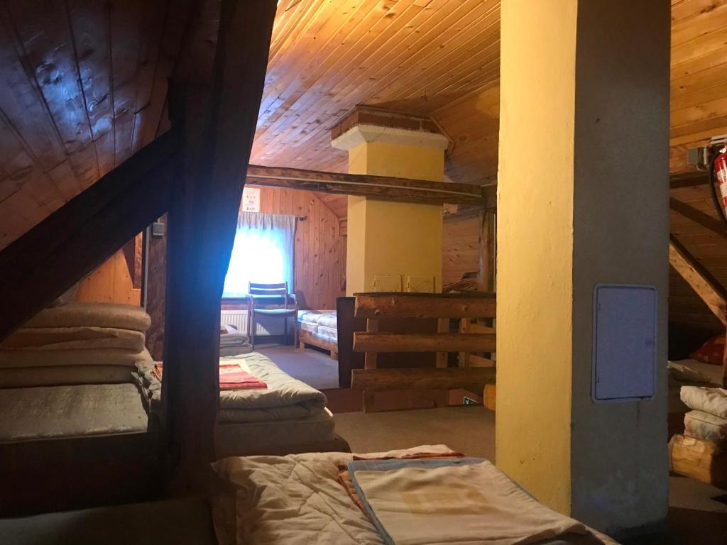 Postel nebo postele na pokoji v ubytování Planinski dom - Mihov dom na Vršiču