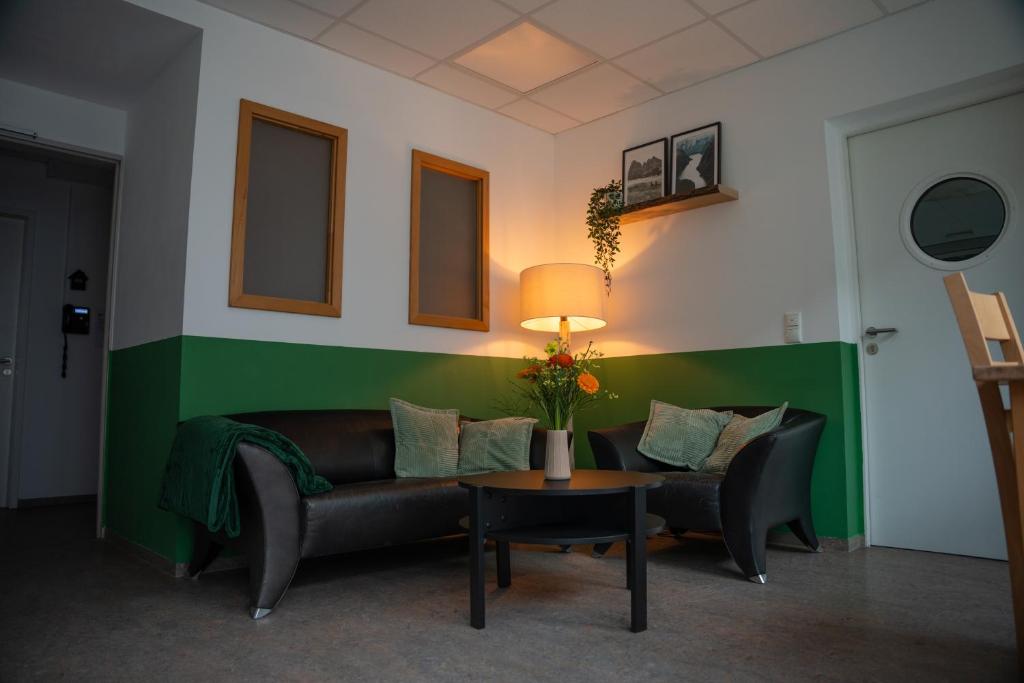 Posezení v ubytování Hotel Garni Fischerfleck in Ismaning near Munich