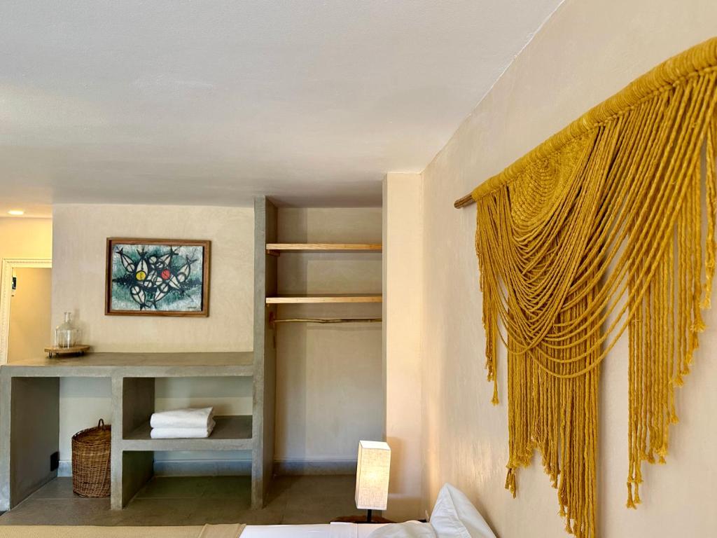 Cama ou camas em um quarto em Pachamaya Holistic Wellness & Spa