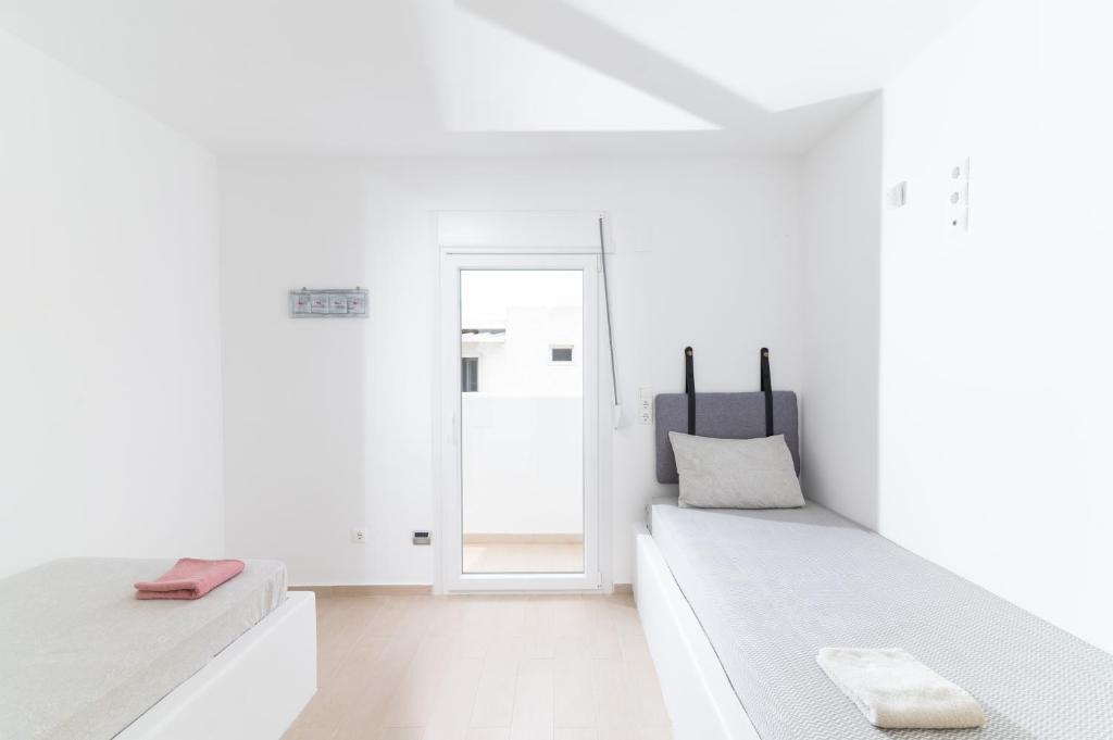 A bed or beds in a room at Nikkon summer home