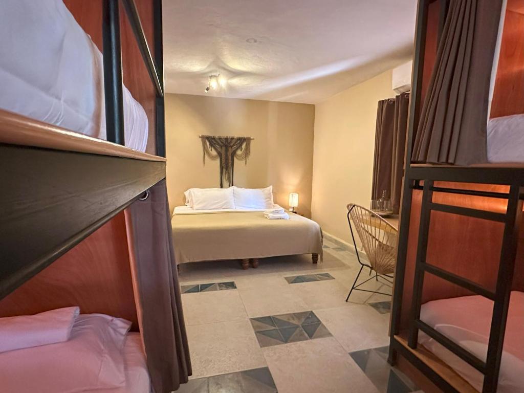 Cama ou camas em um quarto em Pachamaya Holistic Wellness & Spa