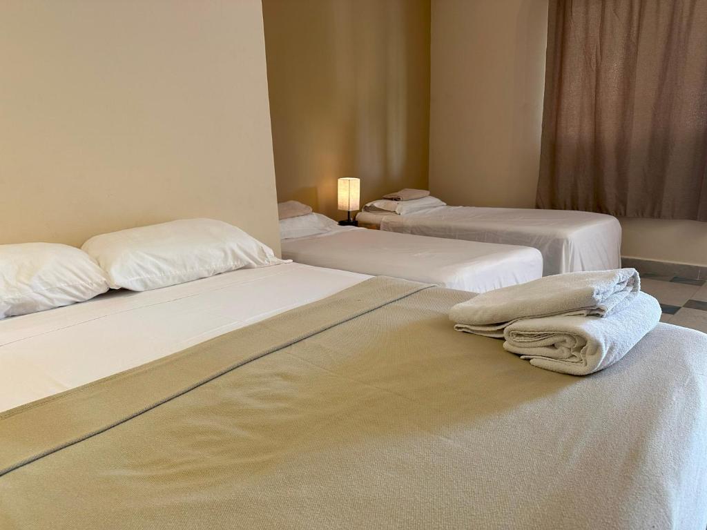 Cama ou camas em um quarto em Pachamaya Holistic Wellness & Spa