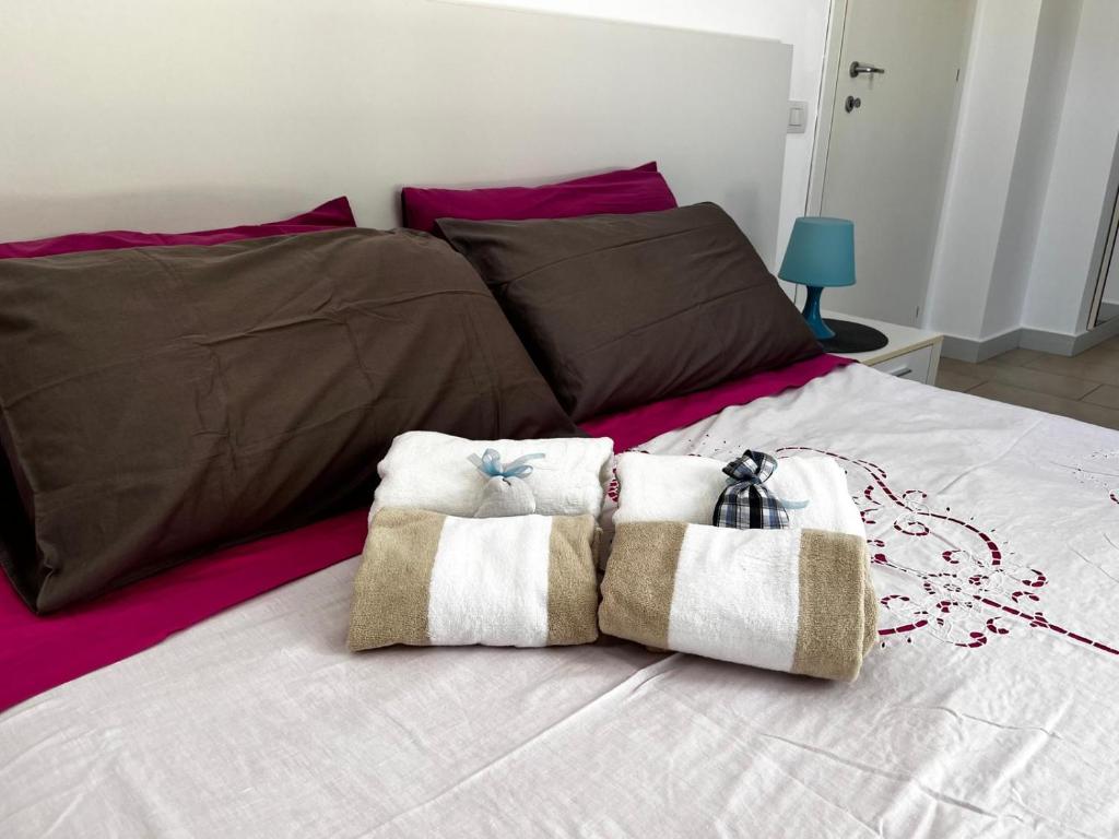 Cama ou camas em um quarto em Alla Scala colorata