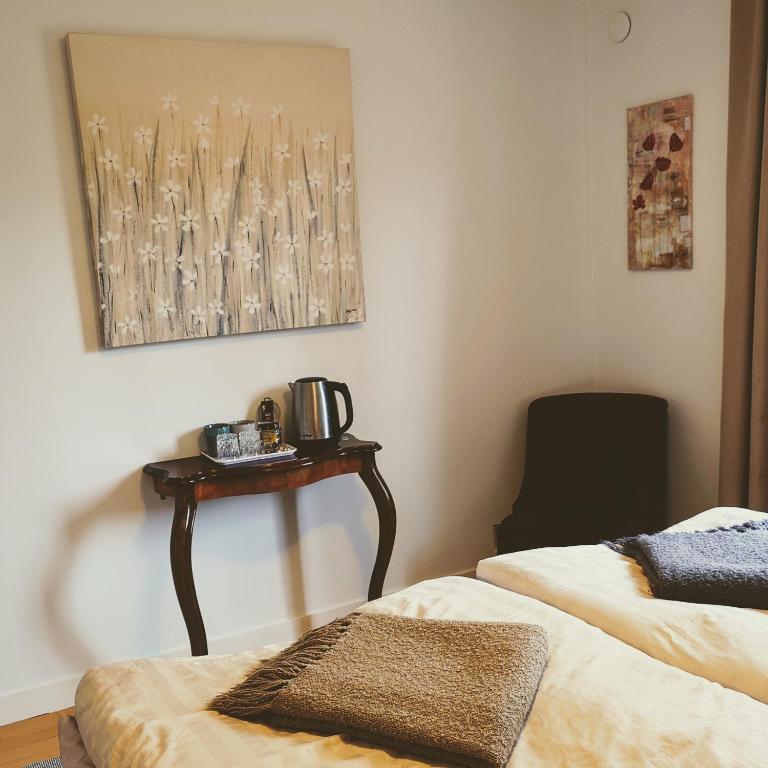 Postel nebo postele na pokoji v ubytování Ales BnB