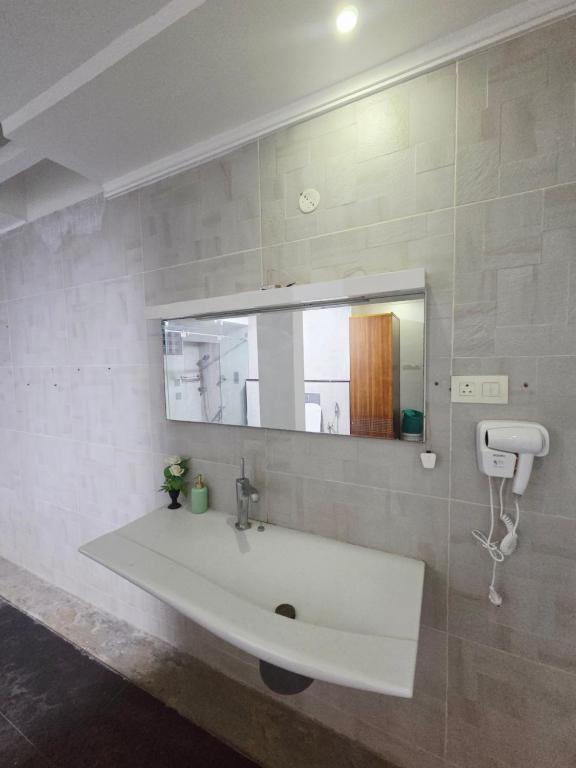 Koupelna v ubytování Hôtel Collena, uthandi
