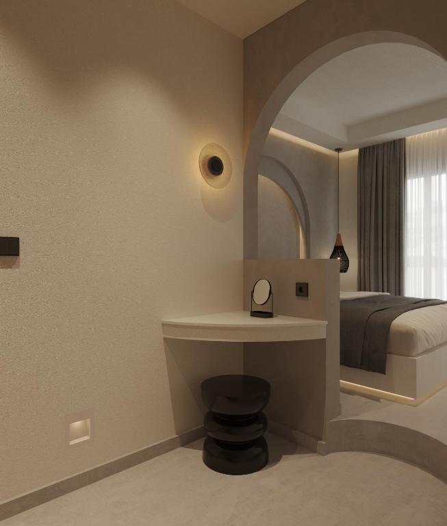 Postel nebo postele na pokoji v ubytování néreya luxury rooms