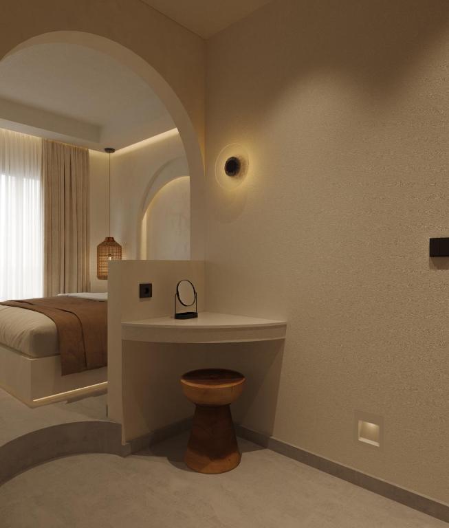 Postel nebo postele na pokoji v ubytování néreya luxury rooms