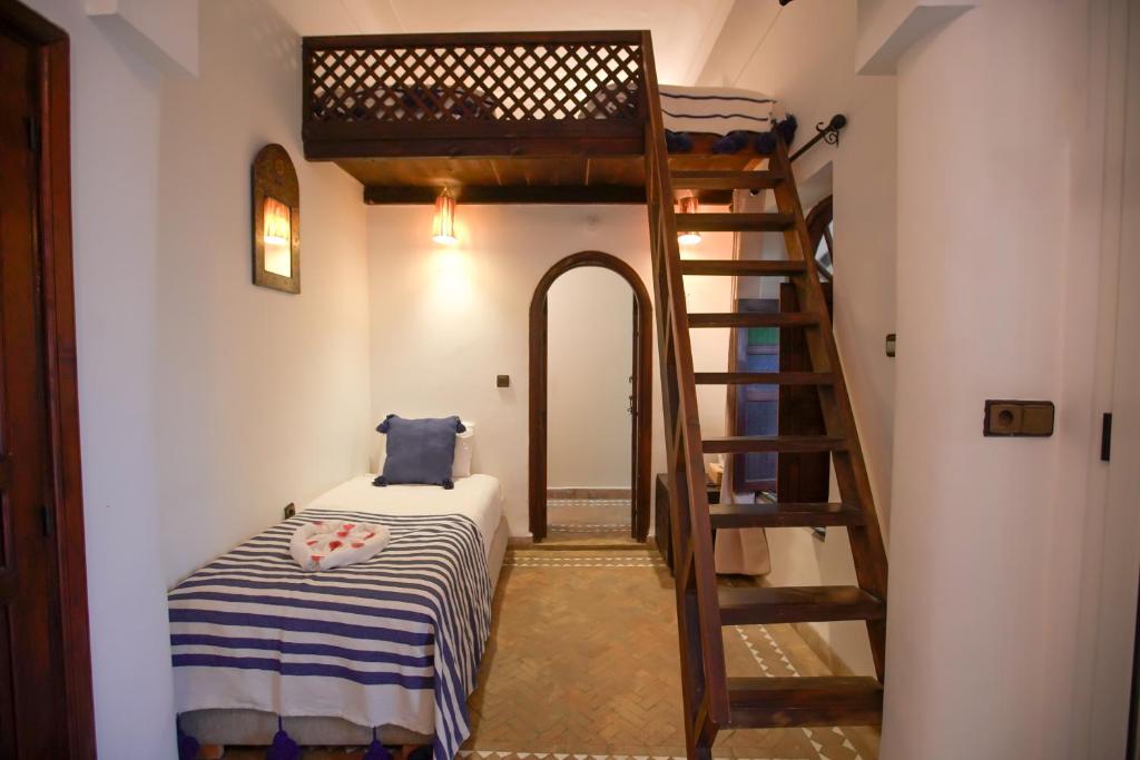 Postel nebo postele na pokoji v ubytování Riad Alma Mouassine