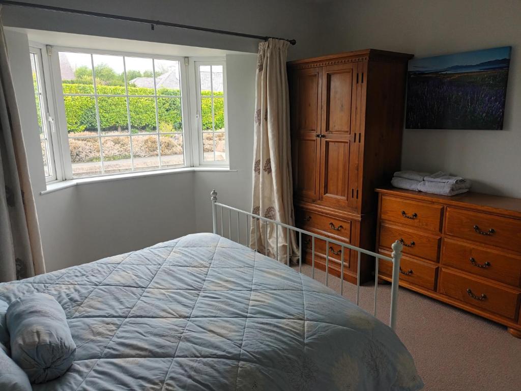 Postel nebo postele na pokoji v ubytování Bungalow in Baltinglass