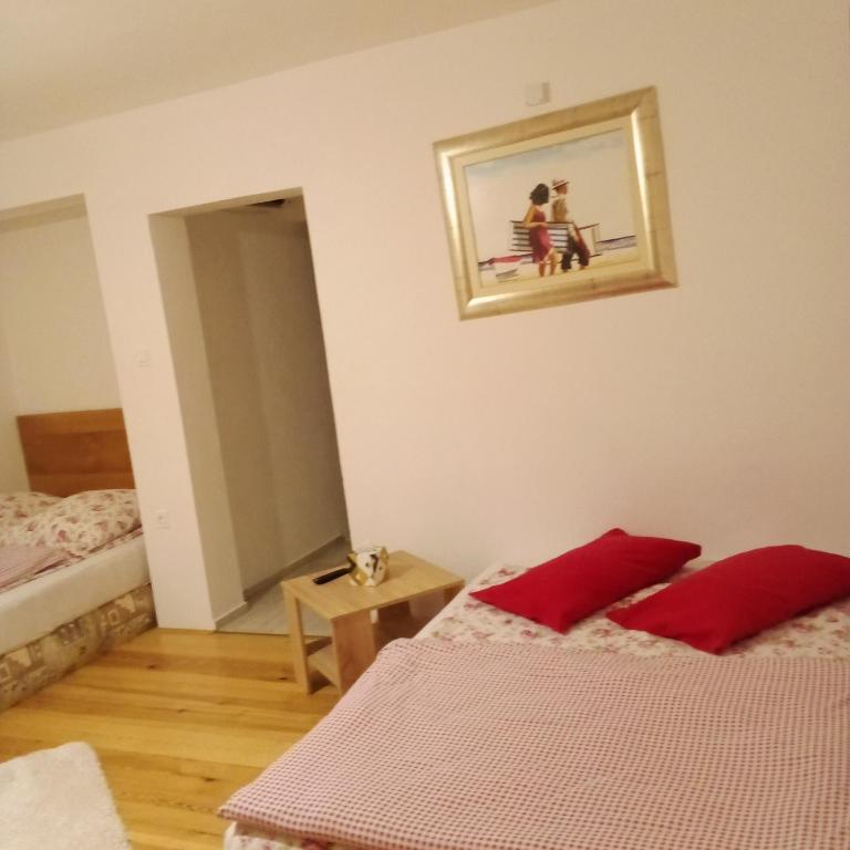 Postel nebo postele na pokoji v ubytování Apartmaji BORŠTNER