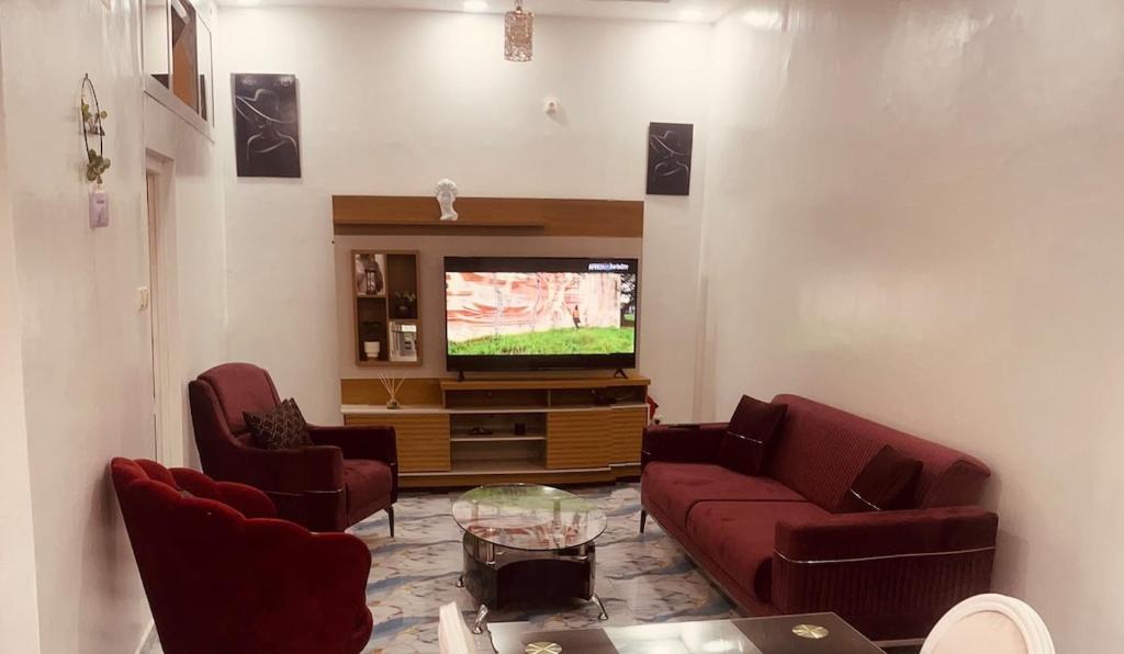 Телевизор и/или развлекательный центр в Appartement chic Hypercentre Yaoundé