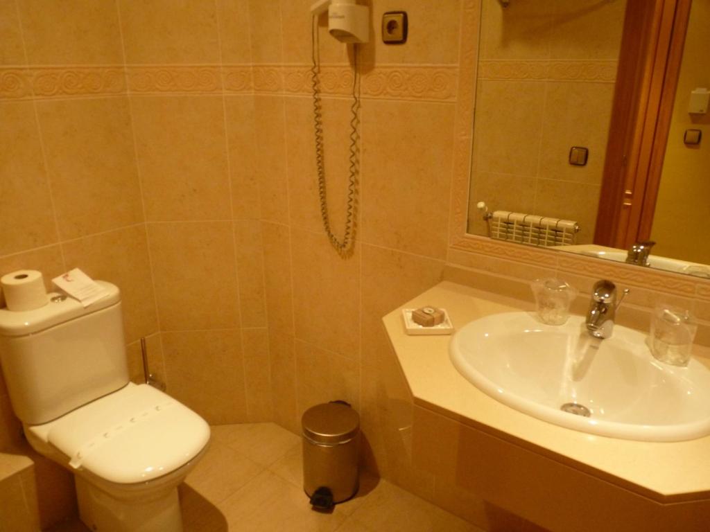 Koupelna v ubytování Petit Hotel