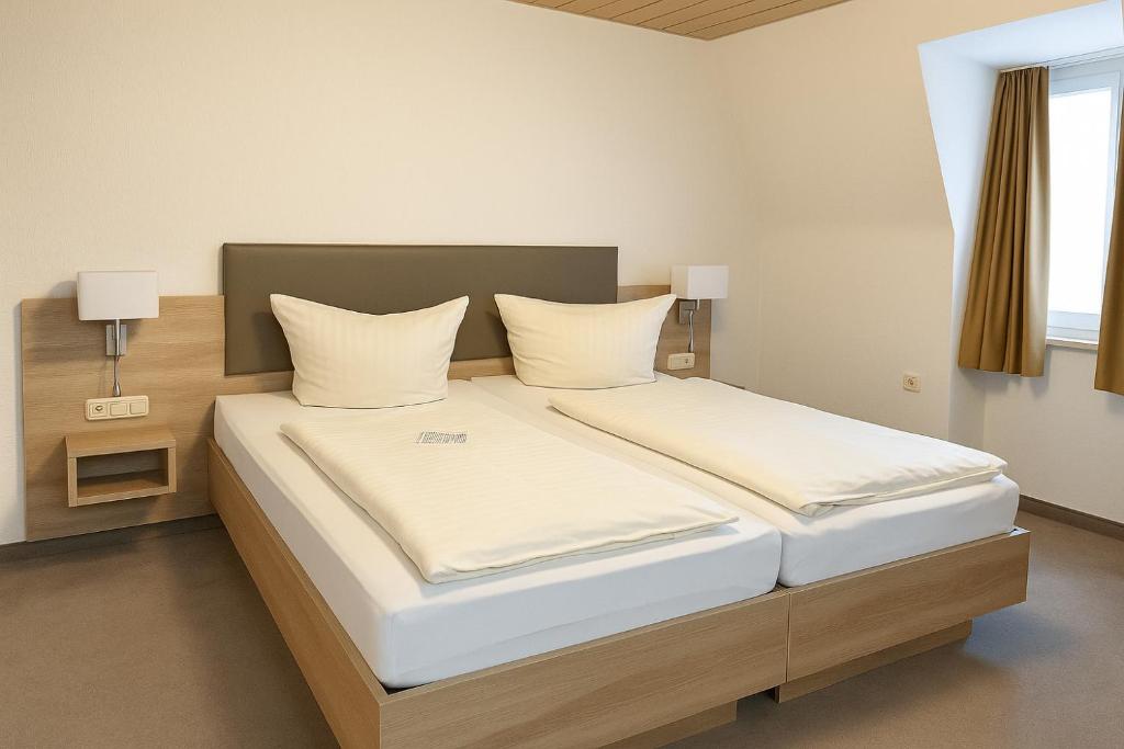 Postel nebo postele na pokoji v ubytování Haven Hotels - Bochum
