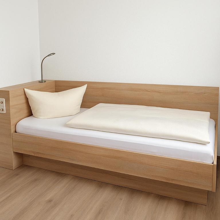 Postel nebo postele na pokoji v ubytování Haven Hotels - Bochum