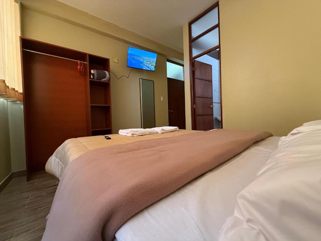 Postel nebo postele na pokoji v ubytování Residencial LOS PINOS habitación doble