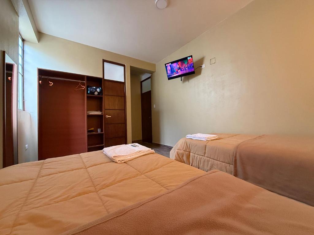 Postel nebo postele na pokoji v ubytování Residencial LOS PINOS habitación doble