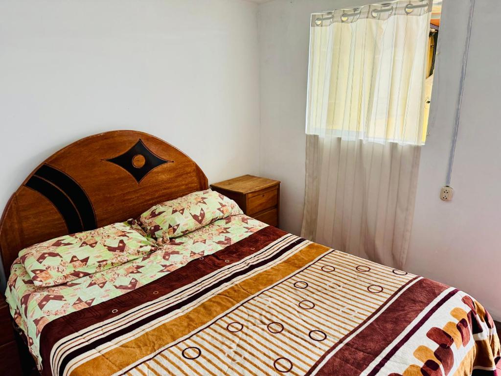 Postel nebo postele na pokoji v ubytování Ukumari Hostel