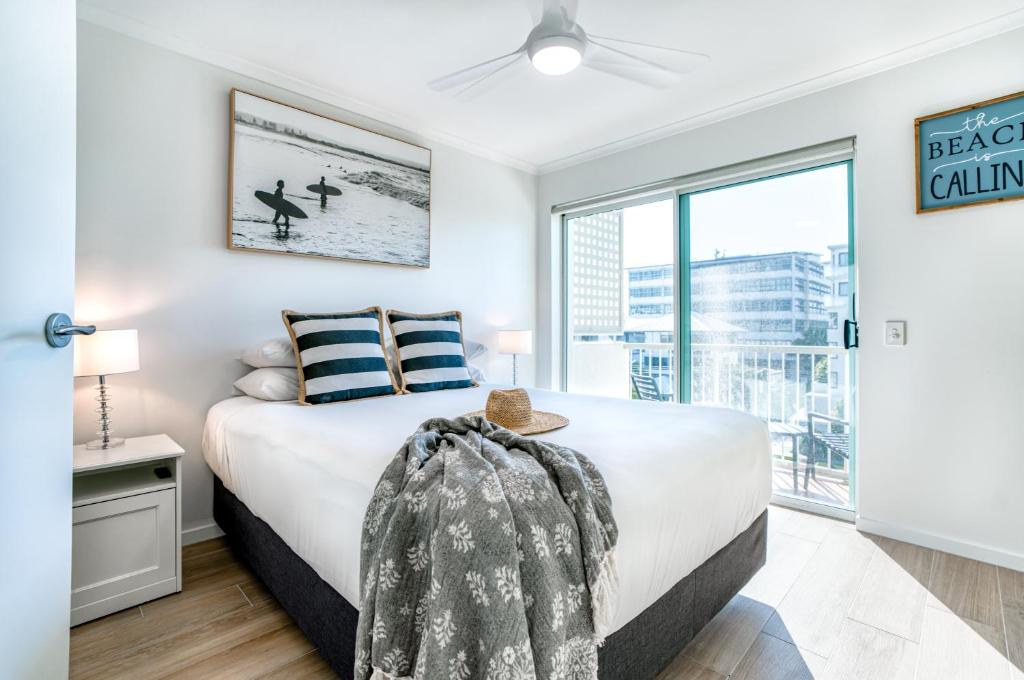 Postel nebo postele na pokoji v ubytování Sailport Mooloolaba Apartments