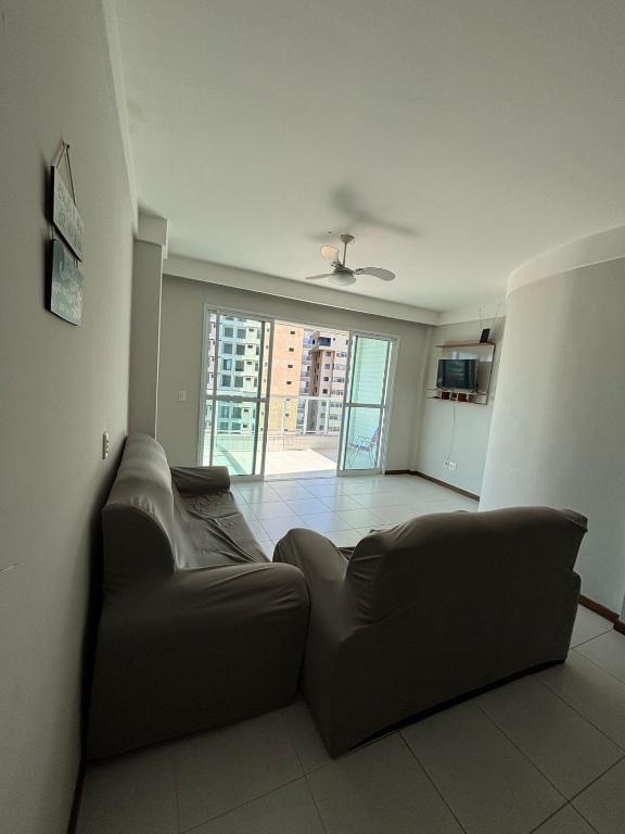 Posezení v ubytování Lumar Apartamento em praia do morro