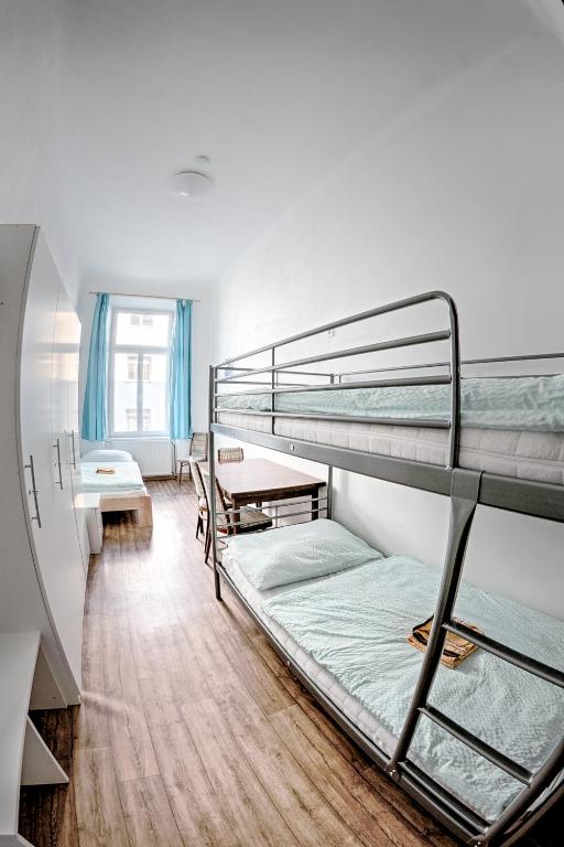 Ένα ή περισσότερα κρεβάτια σε δωμάτιο στο Cuba Bar & Hostel