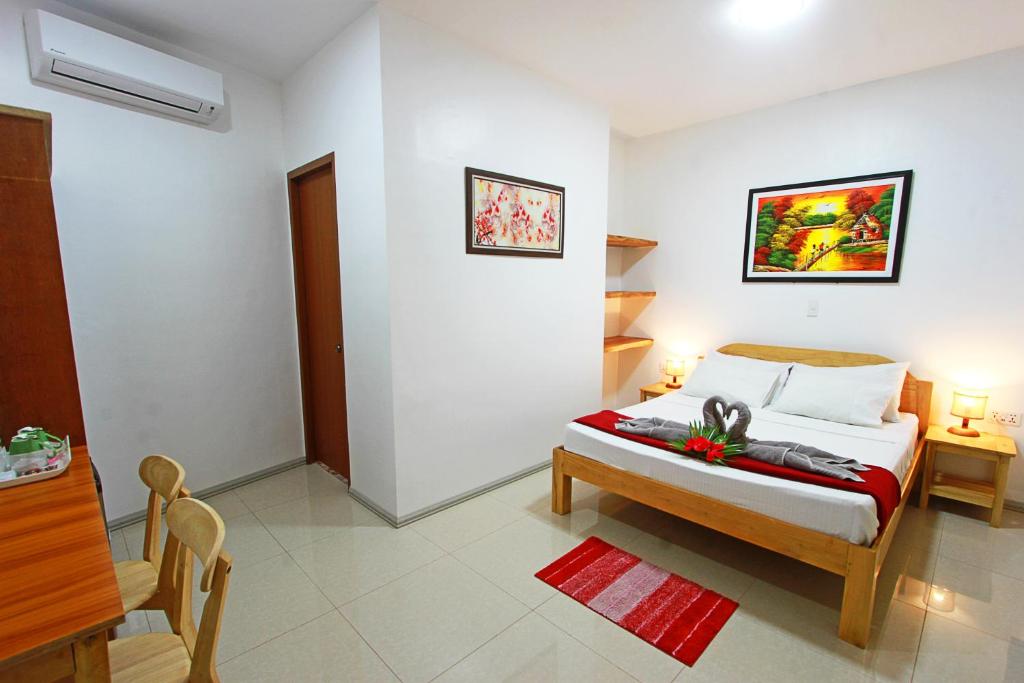 Postelja oz. postelje v sobi nastanitve Sambag Hideaway Bungalows