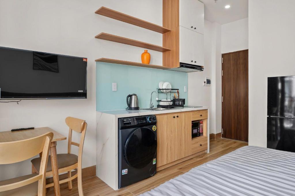 Kuchyň nebo kuchyňský kout v ubytování Eleva Apartment