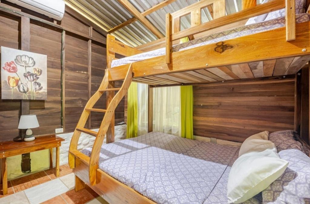 Postel nebo postele na pokoji v ubytování Cabaña paraíso escondido