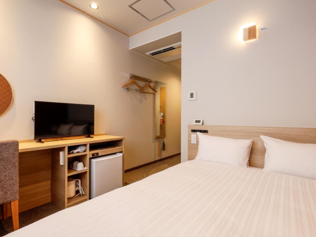 TV a/nebo společenská místnost v ubytování Hotel Kii Tanabe