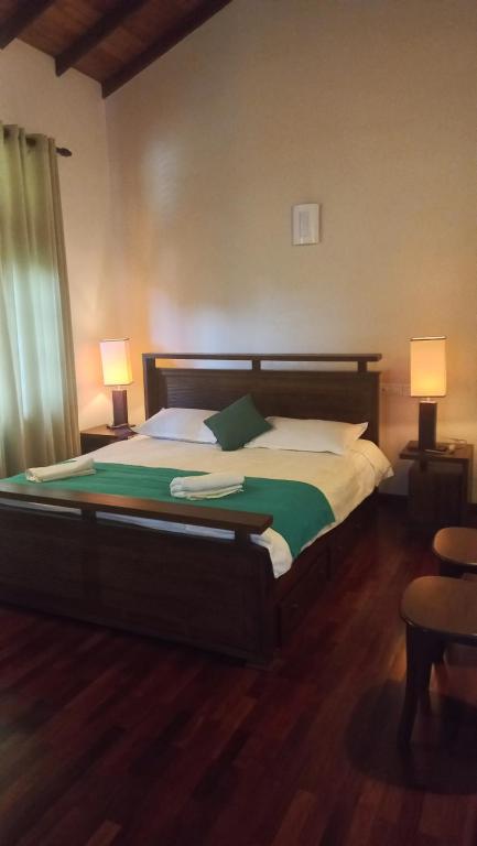 Postel nebo postele na pokoji v ubytování Lewis Homestay