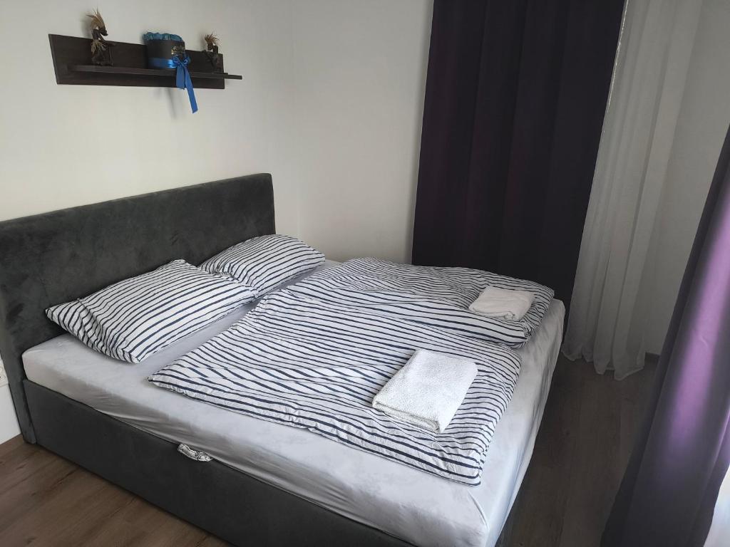 Postel nebo postele na pokoji v ubytování Jasmina