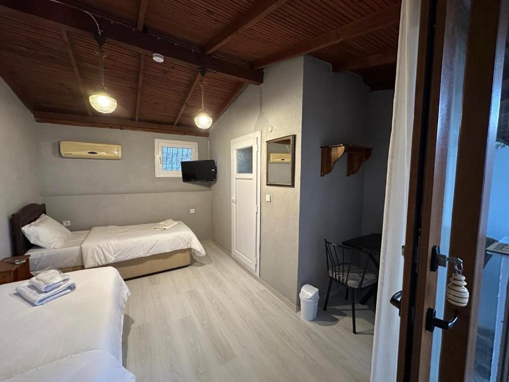 Giường trong phòng chung tại Atillas Getaway