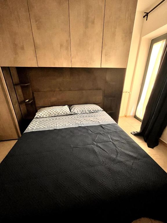 Letto o letti in una camera di Il rifugio urbano