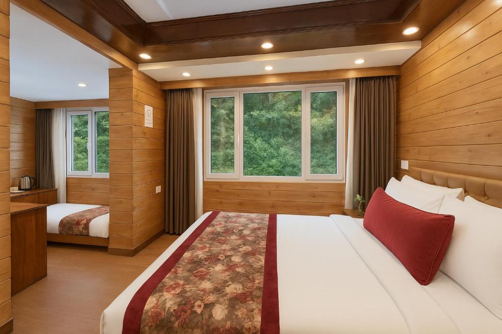 Postel nebo postele na pokoji v ubytování Summit Grace Boutique Hotel & Spa