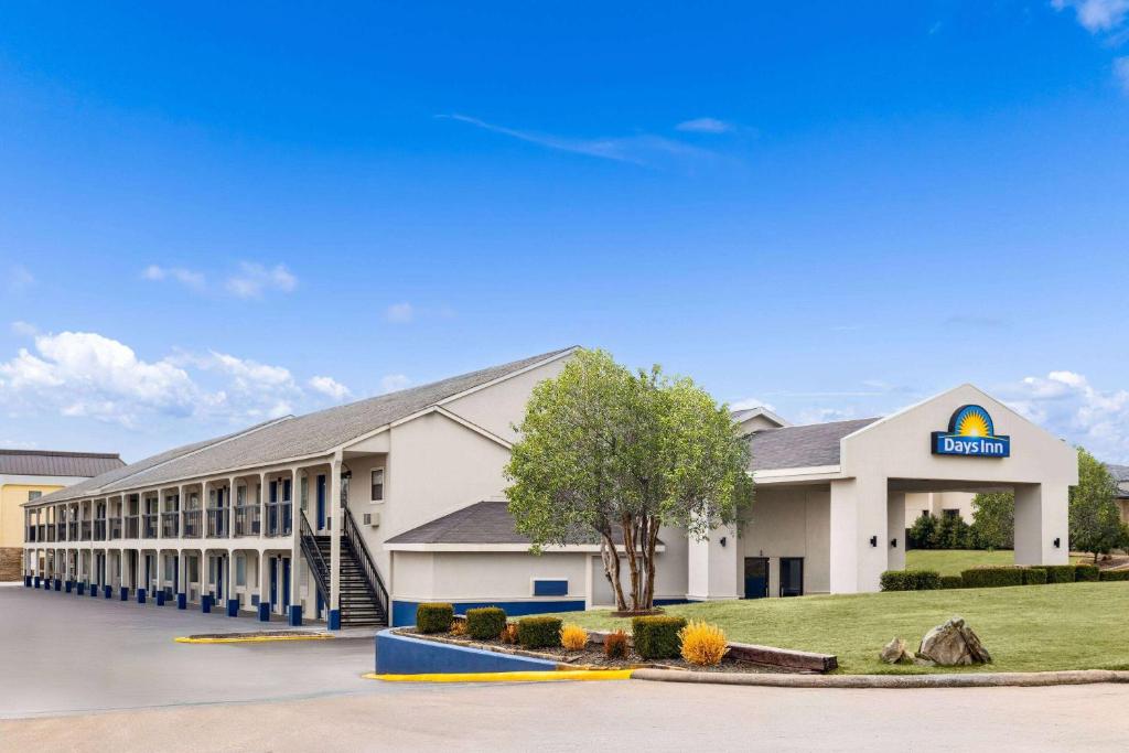 a rendering of the front of a hotel at Days Inn by Wyndham Ardmore in Ardmore