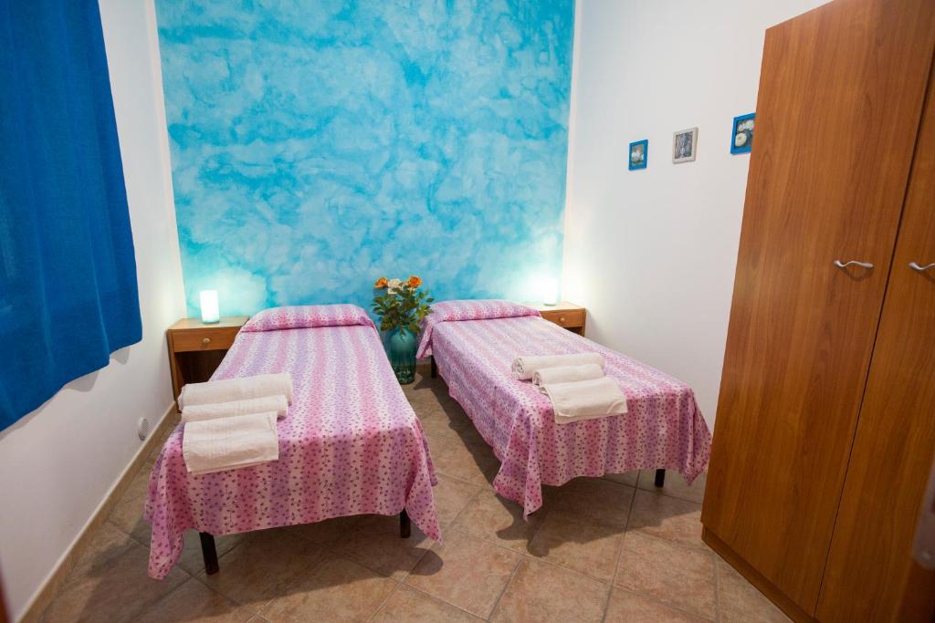 Posteľ alebo postele v izbe v ubytovaní Hortensia House