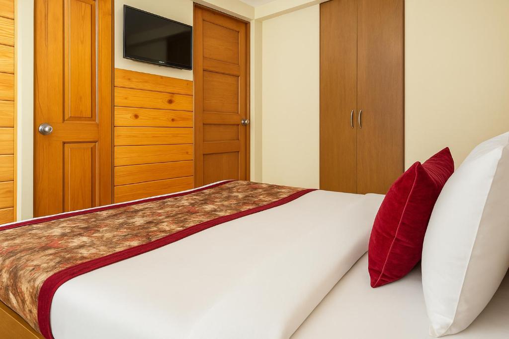 Postel nebo postele na pokoji v ubytování Summit Grace Boutique Hotel & Spa