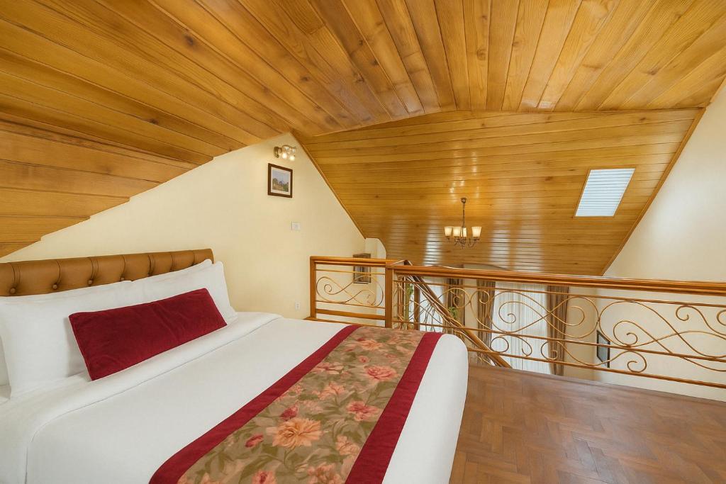 Postel nebo postele na pokoji v ubytování Summit Grace Boutique Hotel & Spa