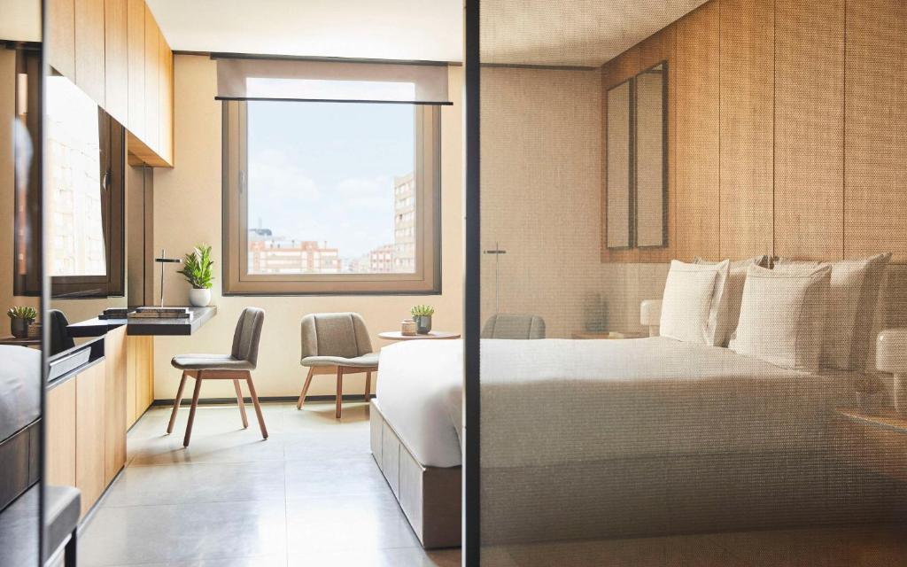 Posteľ alebo postele v izbe v ubytovaní Grand Hyatt Barcelona