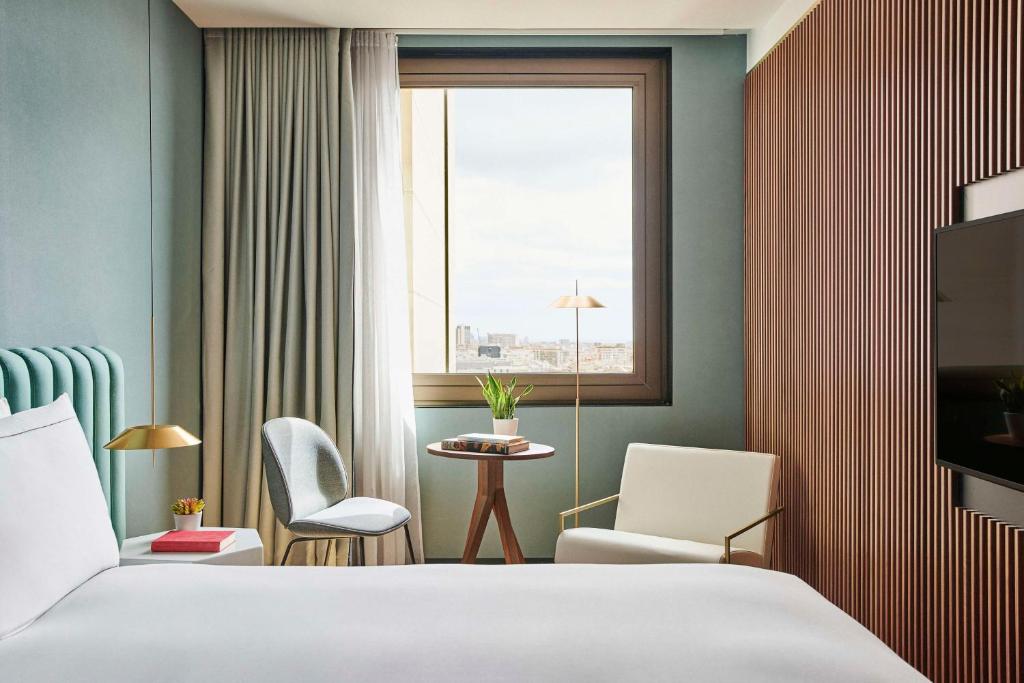 Posteľ alebo postele v izbe v ubytovaní Grand Hyatt Barcelona